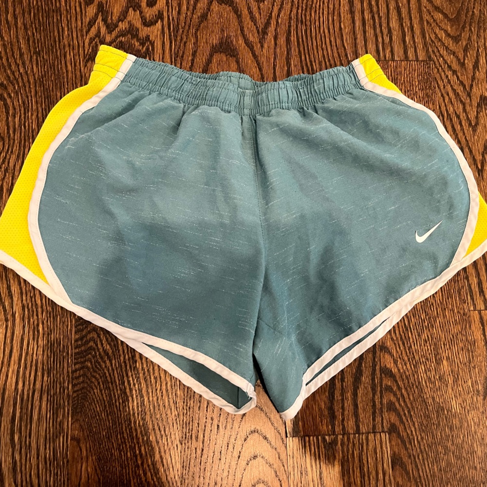 Girls Nike Dri-FIT running shorts, teal and green